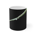 Dew-covered grass blade nature photograph printed on an 11 oz white ceramic mug