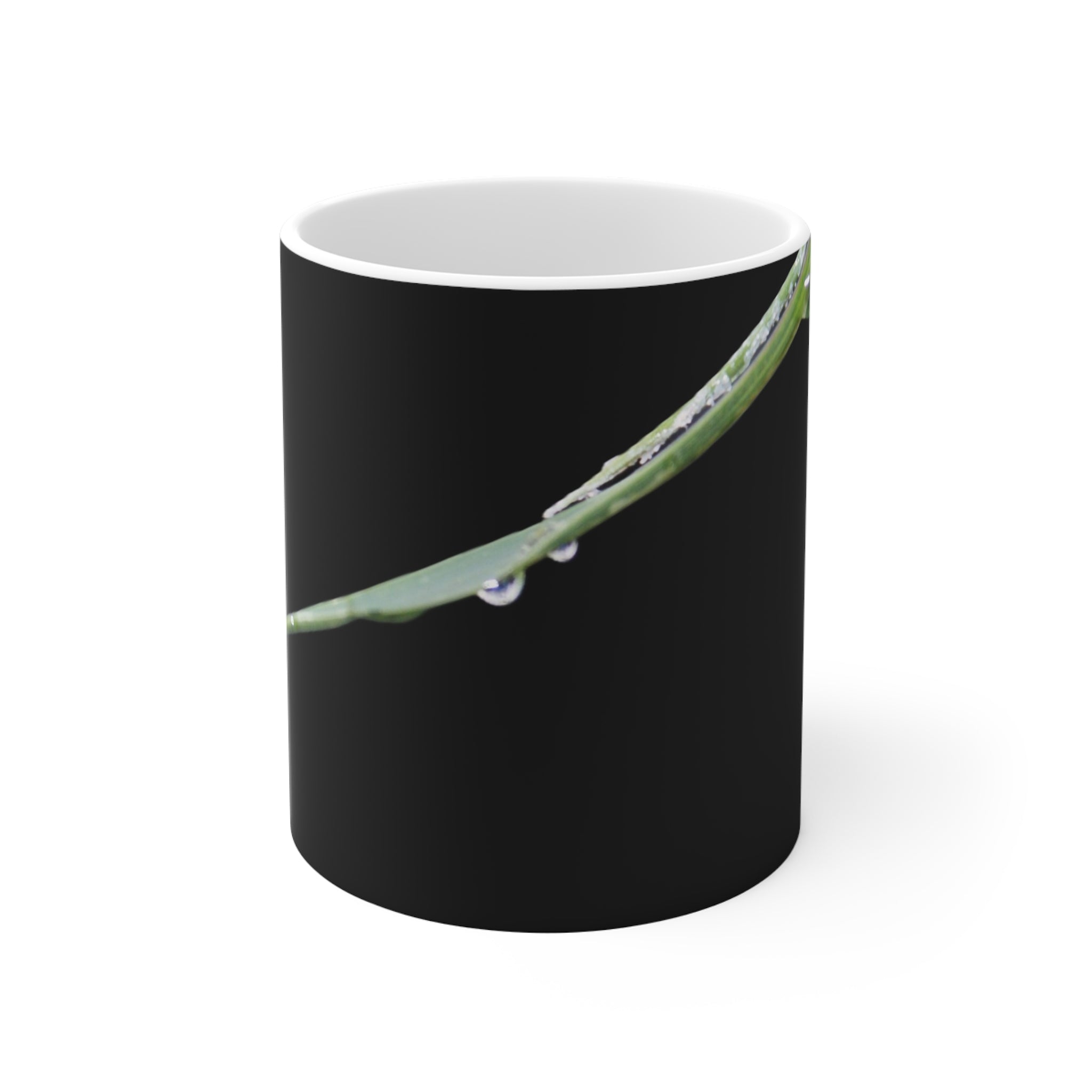 Dew-covered grass blade nature photograph printed on an 11 oz white ceramic mug