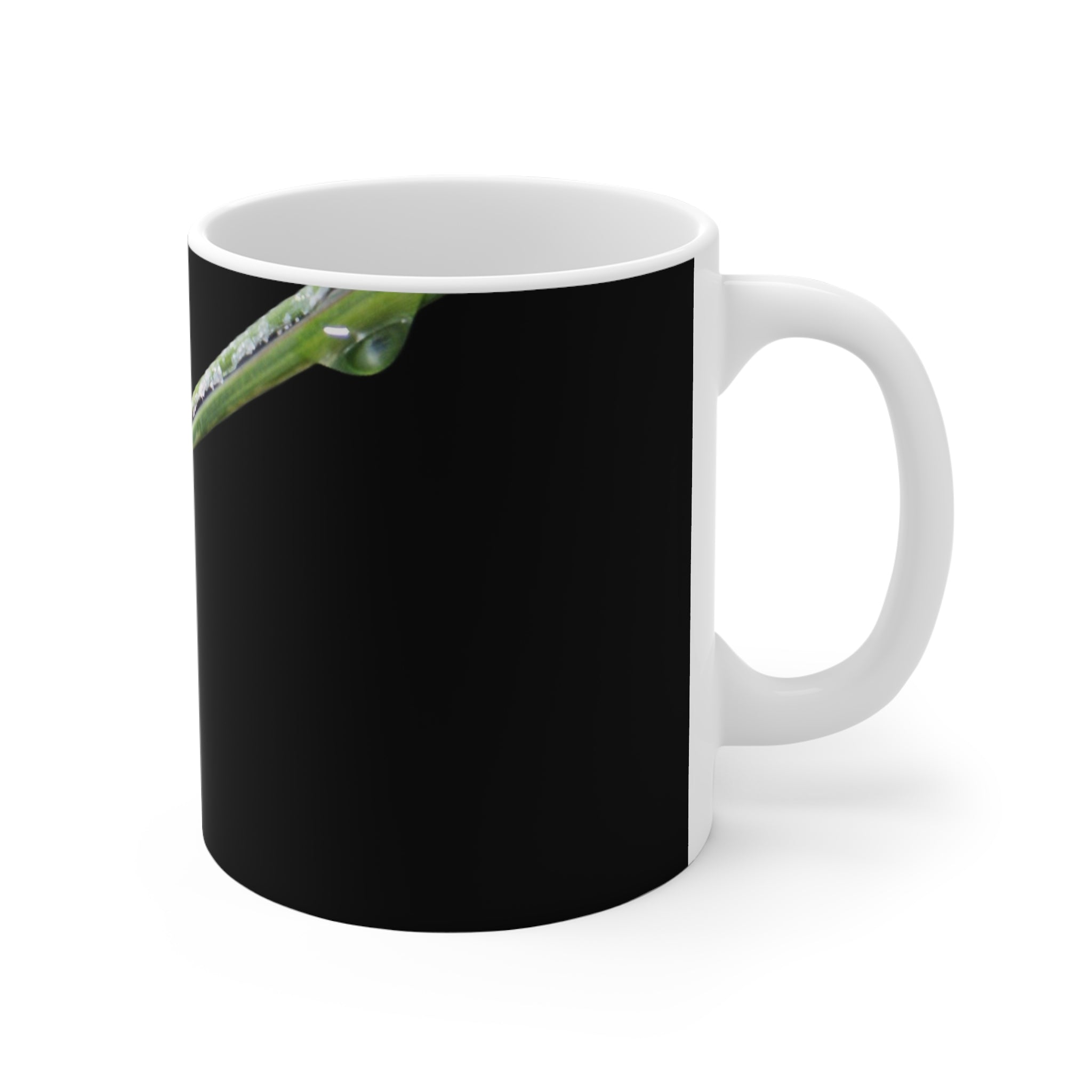 Dew-covered grass blade nature photograph printed on an 11 oz white ceramic mug