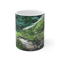 Moss-covered woodland tree photograph printed on an 11 oz white ceramic mug